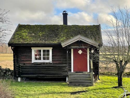 Backgårdens Timmerstuga